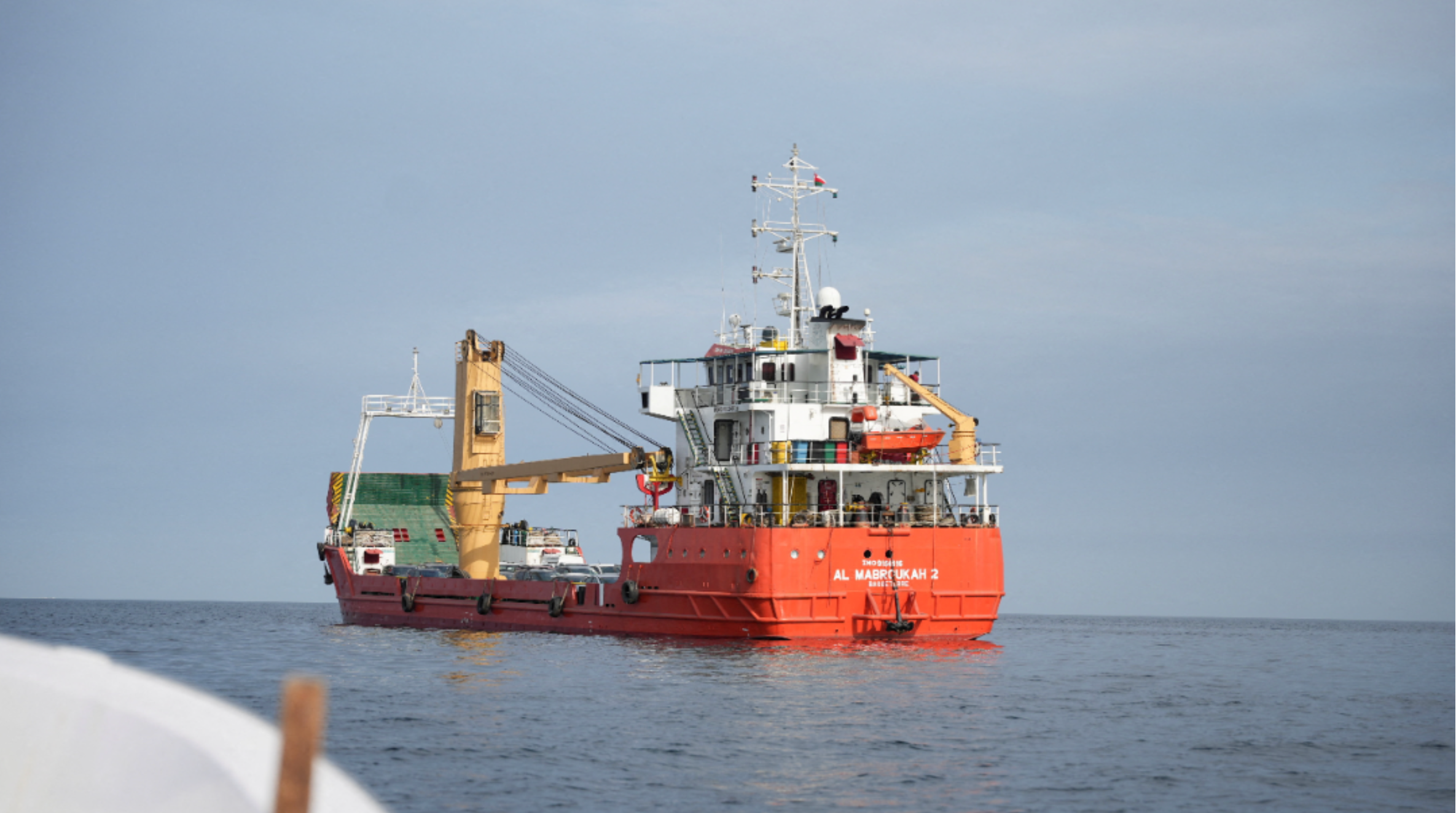 Commercial vessel at sea representing the shipping routes used for Iranian oil exports.